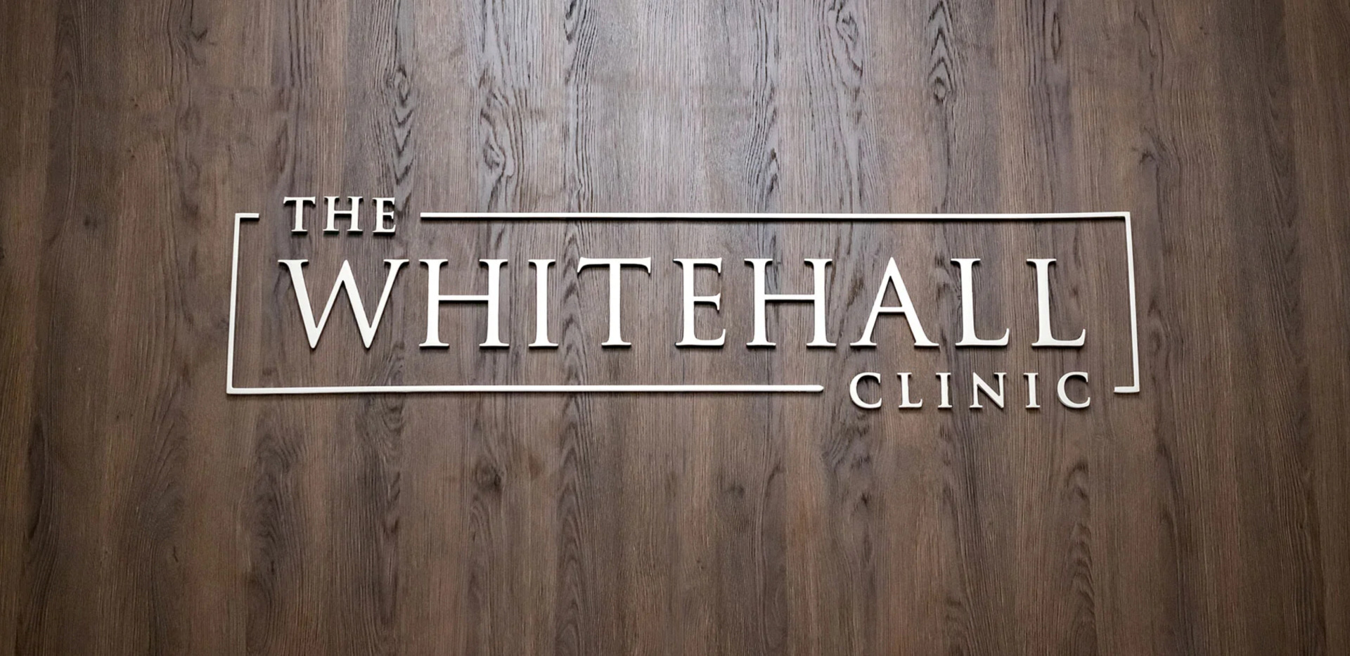 Whitehall Clinic logo on wall